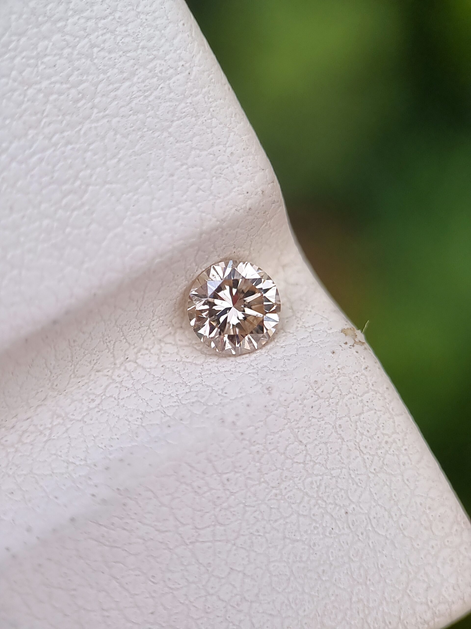 0.31 Carat Natural Round Brilliant Diamond, S-T Color, SI2 Clarity, Strong Blue Fluorescence