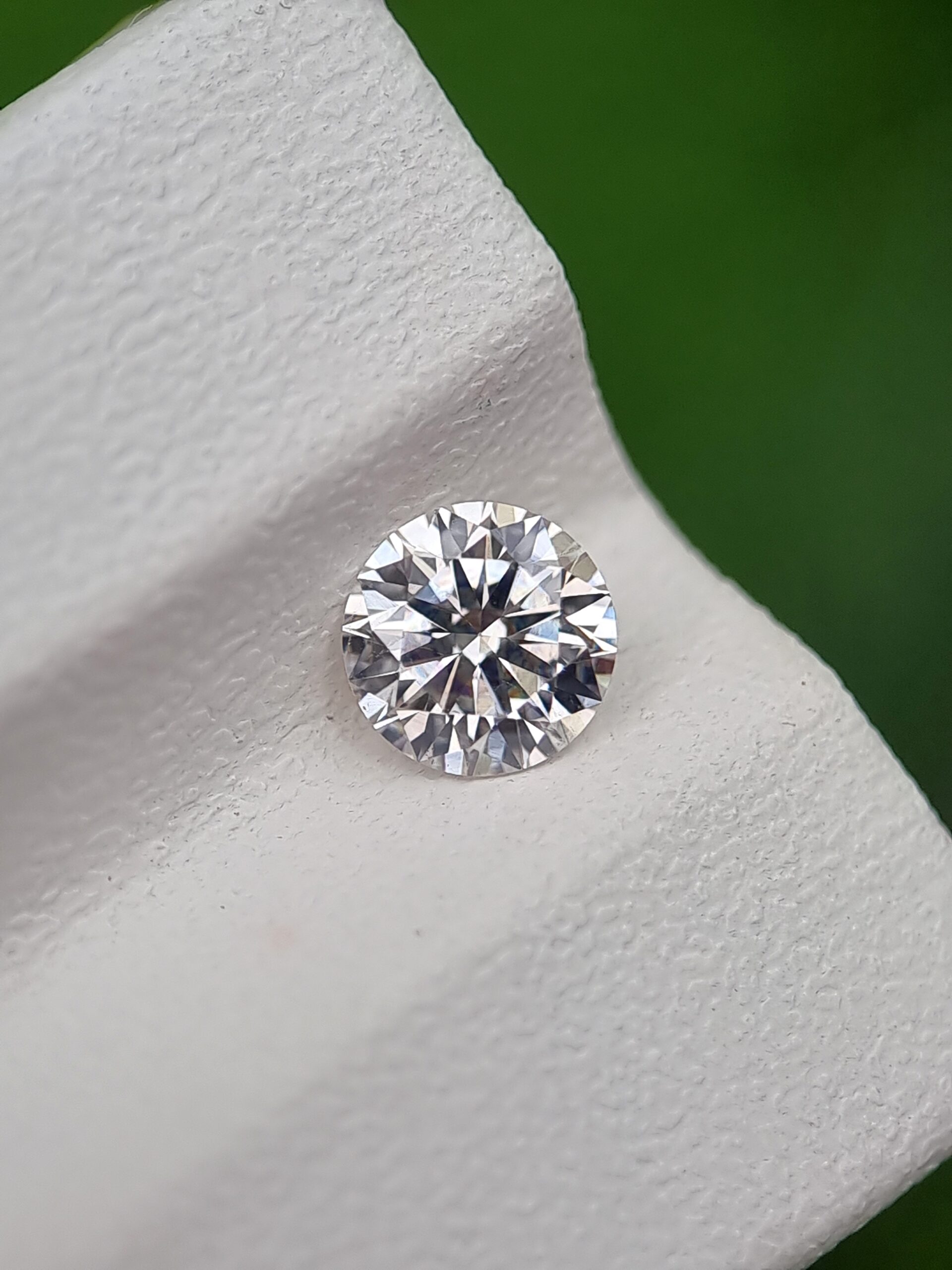0.55ct Round Brilliant Cut Natural Diamond - J Color, SI2 Clarity, Certified