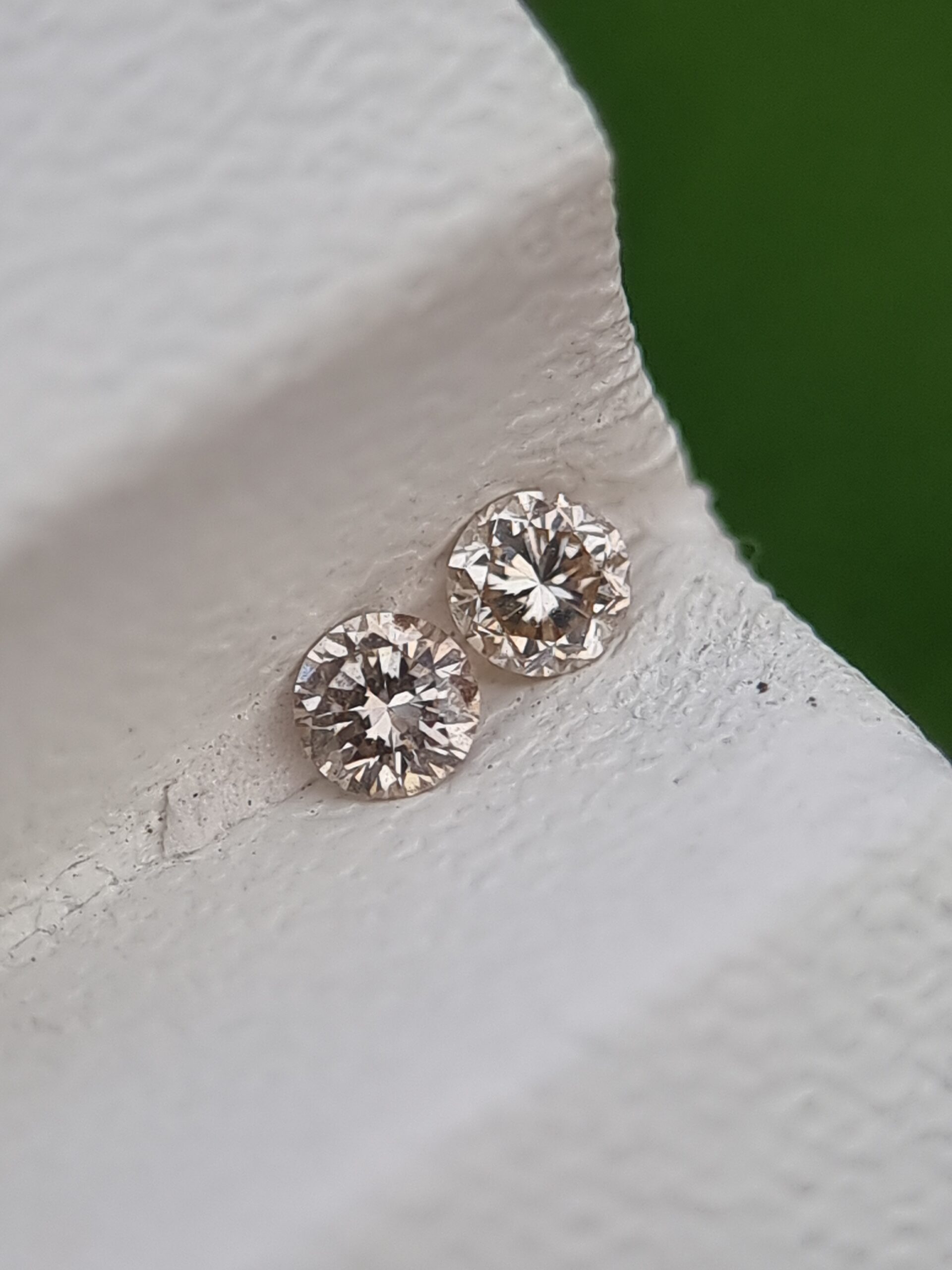 Pair of Natural Diamonds, Round Brilliant Cut, 0.05 ct Each, Good Grade